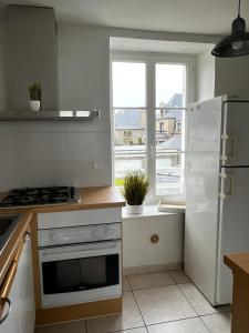 Η κουζίνα ή μικρή κουζίνα στο Appartement vue Mer Giraud 1 Dinard