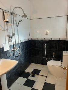Baðherbergi á Hari Hari Hostel