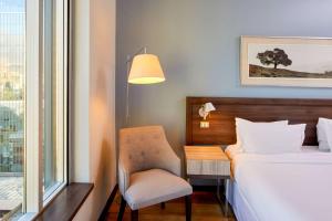 Postel nebo postele na pokoji v ubytování Radisson Blu Plaza El Bosque Santiago
