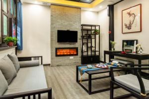 Posezení v ubytování Pingyao Ziwenge Inn