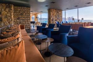 Posezení v ubytování Radisson Blu Acqua Hotel & Spa Concon