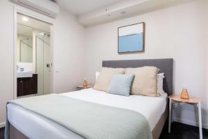 First Light Mooloolaba, Ascend Hotel Collection客房内的一张或多张床位