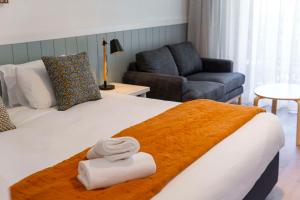 The Quarters, Ascend Hotel Collection客房内的一张或多张床位