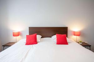 Postel nebo postele na pokoji v ubytování Comfort Aparthotel Besancon La City