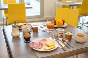 Možnosti snídaně pro hosty v ubytování Comfort Aparthotel Besancon La City