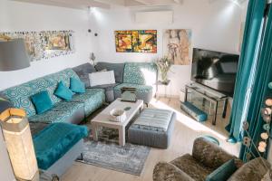 Posezení v ubytování Chambres d'hôtes de Larouquette