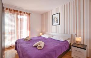 Posteľ alebo postele v izbe v ubytovaní Two-Bedroom Apartment In Stanici