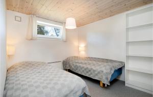Postel nebo postele na pokoji v ubytování Holiday Home Mariesvej Sæby Iii