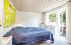 Postel nebo postele na pokoji v ubytování Holiday Home Mariesvej Sæby Iii