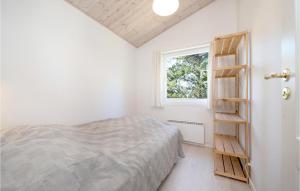 Postel nebo postele na pokoji v ubytování Holiday Home Mariesvej Sæby Iii