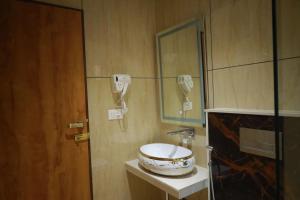 Koupelna v ubytování Sree Grand Inn