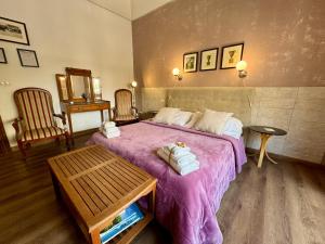 Postel nebo postele na pokoji v ubytování Aedes B&B Il Giardino dei Sogni