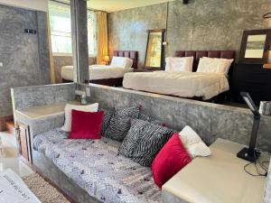 Postel nebo postele na pokoji v ubytování Kookie Place Homestay