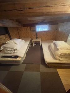 Voodi või voodid majutusasutuse GYPSY TAKASHIMA toas