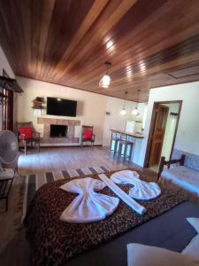 Ένα ή περισσότερα κρεβάτια σε δωμάτιο στο Chalés vale da mata