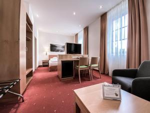 Telewizja i/lub zestaw kina domowego w obiekcie Faulenzerhotel