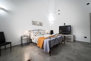 Postel nebo postele na pokoji v ubytování Coraline Home by Vivimy