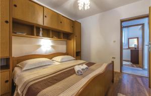 Posteľ alebo postele v izbe v ubytovaní Holiday Home Vinisce Pod Balankinu