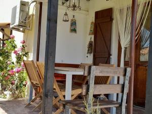 a table and chairs sitting on a patio at Villa S'Oliariu in Martis