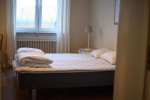 Voodi või voodid majutusasutuse Falköpings Vandrarhem/Hostel toas