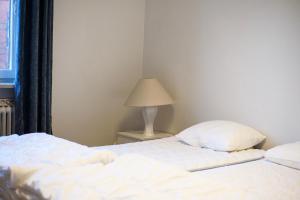 Voodi või voodid majutusasutuse Falköpings Vandrarhem/Hostel toas