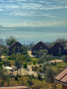 a group of houses sitting on top of a hill at Luna Home Club in Samandağı