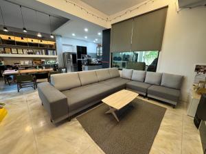a living room with a couch and a table at 貳樓居 in Shanhua