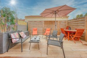 Un patio sau altă zonă în aer liber la La Maison des Sables - Maison pour 6 parking privé