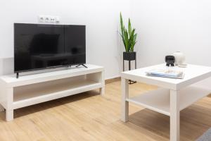 TV a/nebo společenská místnost v ubytování VLC HOST- B&B Fray Pedro