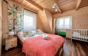 Katil atau katil-katil dalam bilik di Lovely Apartment In Ratulow With Wifi