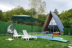 Κήπος έξω από το Happy Enjoy Bungalow