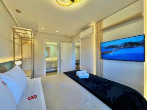 Cama ou camas em um quarto em Monte Lussari 203A - Apê NOVO no Bavária Gramado
