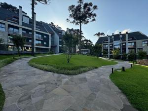 Um jardim em Monte Lussari 203A - Apê NOVO no Bavária Gramado
