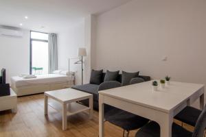 Postel nebo postele na pokoji v ubytování VLC HOST- B&B Fray Pedro