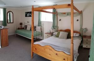 Cama ou camas em um quarto em Staden Grange