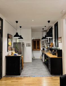 Kuchyň nebo kuchyňský kout v ubytování Casa Consell Gran Via, Guest House