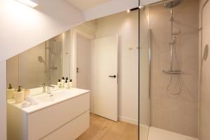 a bathroom with a sink and a shower at SHWAY - The Seaman's Sight in Antwerp +34 photos