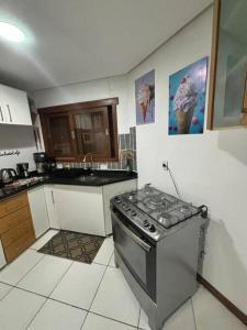 A cozinha ou cozinha compacta de Apto térreo #3- Moradas do Pier- 2 quartos, 1 banheiro a passos da areia
