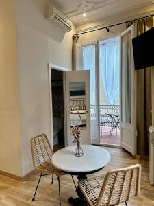 TV a/nebo společenská místnost v ubytování Casa Consell Gran Via, Guest House