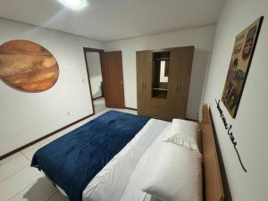 Cama ou camas em um quarto em Apto térreo #3- Moradas do Pier- 2 quartos, 1 banheiro a passos da areia