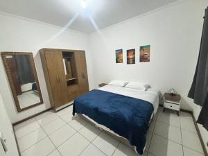 Cama ou camas em um quarto em Apto térreo #3- Moradas do Pier- 2 quartos, 1 banheiro a passos da areia mais 36 fotos