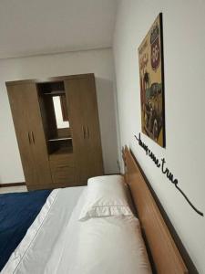 Cama ou camas em um quarto em Apto térreo #3- Moradas do Pier- 2 quartos, 1 banheiro a passos da areia