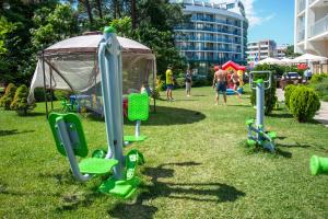 a group of playground equipment in a park at Viand Hotel - Premium All Inclusive in Sunny Beach