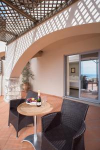 Posedenie v ubytovaní Movenpick Resort Agios Nikolaos Sivota