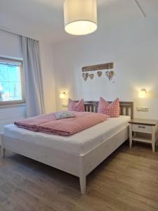A bed or beds in a room at Piz Buin