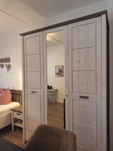 A bed or beds in a room at Piz Buin