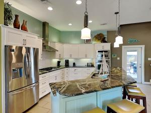 Kuchyň nebo kuchyňský kout v ubytování Coastal Cotter