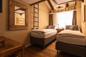Postel nebo postele na pokoji v ubytování Elfi - luxury mountain bijou by Inspiringplaces Zermatt