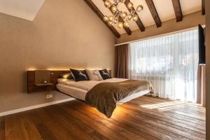Postel nebo postele na pokoji v ubytování Elfi - luxury mountain bijou by Inspiringplaces Zermatt
