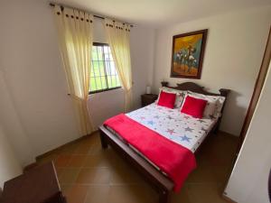 Postel nebo postele na pokoji v ubytování RANCHO SAN LUIS, Páramo
